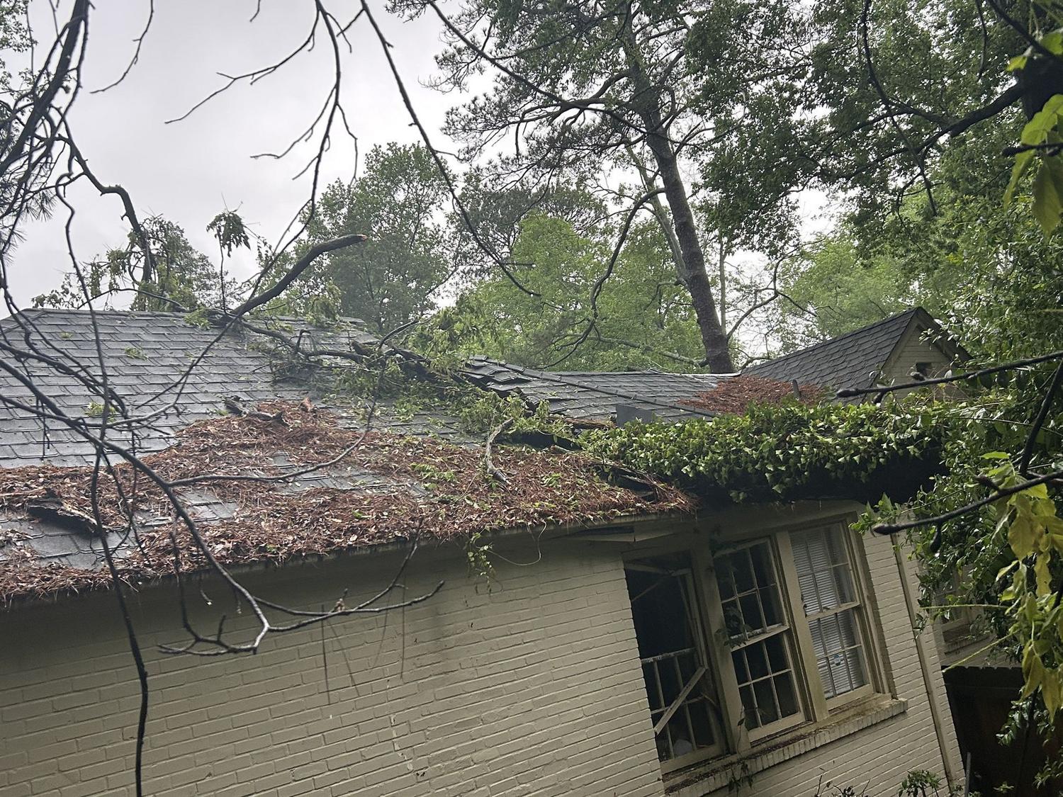 Before — tree impact damage to roof, Columbus GA